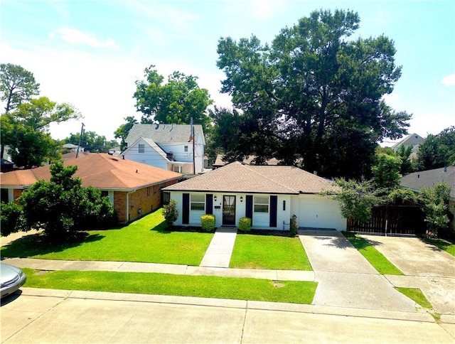 917 Belmont Pl, Metairie, LA 70001 - view of front facade with driveway, a front lawn, and a garage