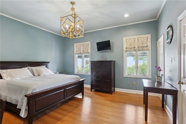 1427 Leontine St New O, Unit New O, New Orleans, LA 70115 - bedroom featuring multiple windows, light wood-style flooring, a chandelier, baseboards, and crown molding