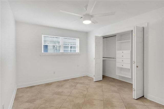 212 Nelson Dr, River Ridge, LA 70123 - unfurnished bedroom with light tile patterned floors, baseboards, a closet, and ceiling fan