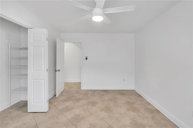212 Nelson Dr, River Ridge, LA 70123 - unfurnished bedroom featuring a closet, baseboards, and light tile patterned floors