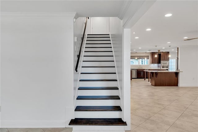 212 Nelson Dr, River Ridge, LA 70123 - stairs with recessed lighting, tile patterned flooring, and baseboards