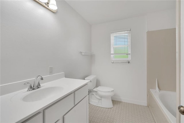 212 Nelson Dr, River Ridge, LA 70123 - full bath with toilet, vanity, baseboards, and tile patterned flooring