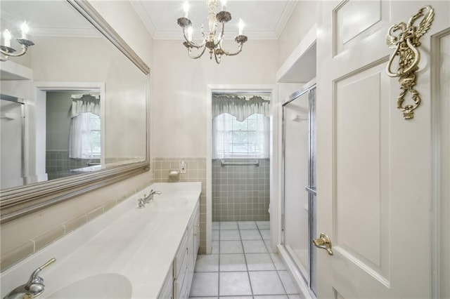 653 Fairfield Ave, Gretna, LA 70056 - bathroom with a chandelier, a shower stall, crown molding, tile patterned flooring, and double vanity