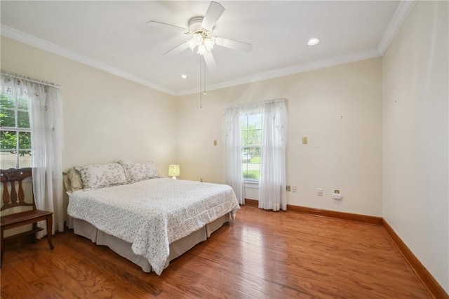 653 Fairfield Ave, Gretna, LA 70056 - bedroom with wood finished floors, baseboards, ornamental molding, ceiling fan, and recessed lighting
