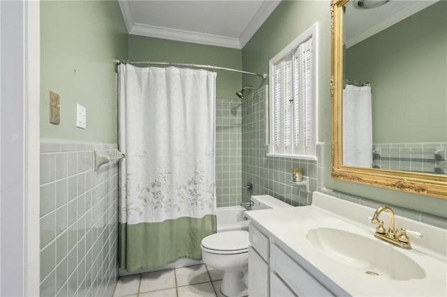 653 Fairfield Ave, Gretna, LA 70056 - bathroom with vanity, crown molding, toilet, tile walls, and tile patterned floors