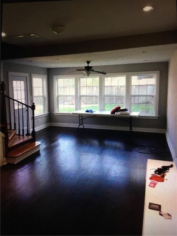 4649 Dart St, New Orleans, LA 70125 - unfurnished room with baseboards, dark wood-style floors, a ceiling fan, recessed lighting, and stairs