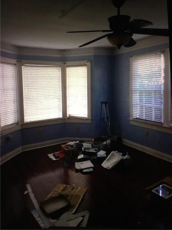 4649 Dart St, New Orleans, LA 70125 - dining space featuring ceiling fan, baseboards, and wood finished floors
