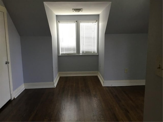 4649 Dart St, New Orleans, LA 70125 - bonus room with wood finished floors, baseboards, and vaulted ceiling