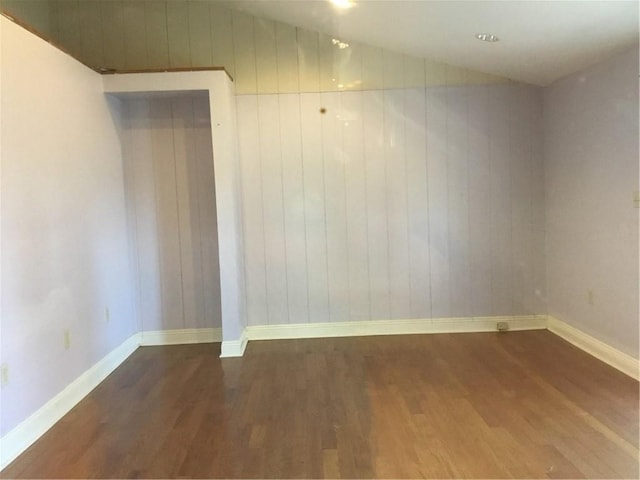 4649 Dart St, New Orleans, LA 70125 - spare room featuring wood finished floors and baseboards