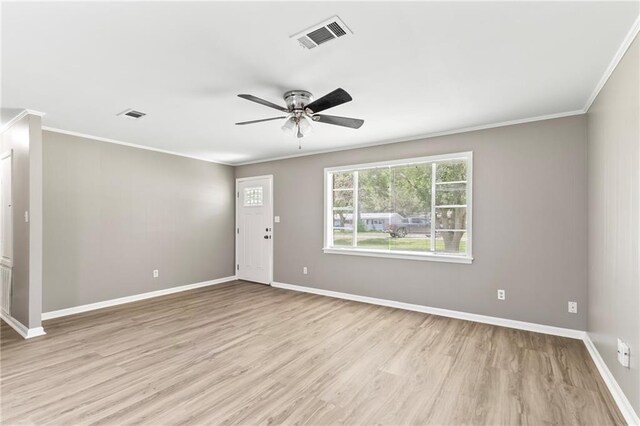 150 Manor Dr, Ponchatoula, LA 70454 - empty room featuring ornamental molding, ceiling fan, light wood-style floors, and baseboards