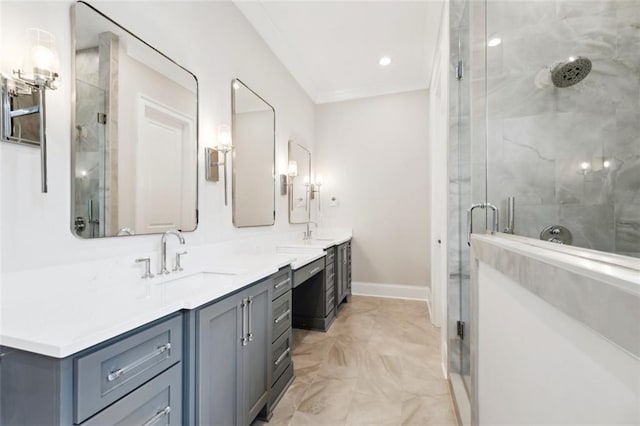 325 Focis St, Metairie, LA 70005 - full bathroom featuring double vanity, marble look tiles, a stall shower, and baseboards