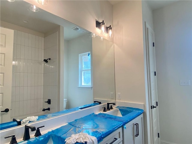 1337 Avenue Lacroix Ave, Lacroix, Covington, LA 70433 - bathroom featuring double vanity, toilet, and shower / bath combination
