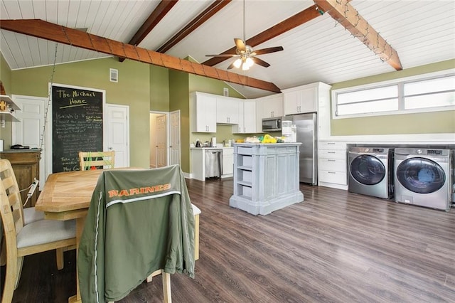 4819 Touro St, New Orleans, LA 70122 - dining room featuring separate washer and dryer, a ceiling fan, dark wood finished floors, and wood ceiling