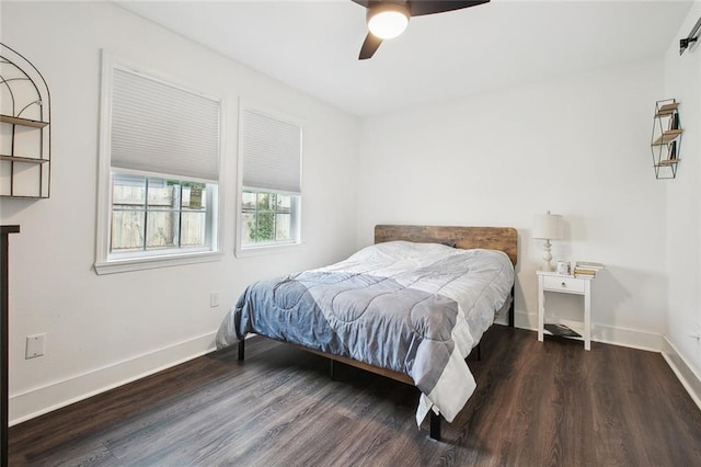 4819 Touro St, New Orleans, LA 70122 - bedroom with wood finished floors, baseboards, and a ceiling fan