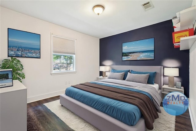 4819 Touro St, New Orleans, LA 70122 - bedroom with baseboards and wood finished floors