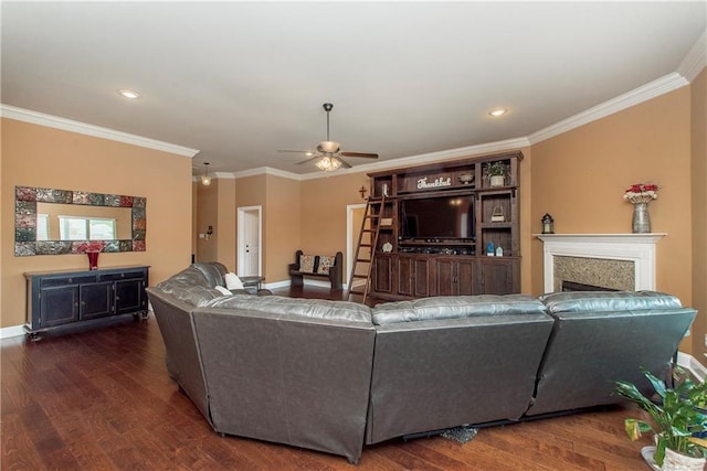422 Scotch Pine Dr, Ponchatoula, LA 70454 - living room featuring a fireplace, ceiling fan, dark wood-style flooring, ornamental molding, and baseboards