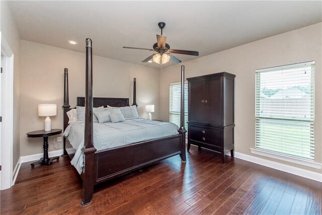 422 Scotch Pine Dr, Ponchatoula, LA 70454 - bedroom with baseboards, wood finished floors, and a ceiling fan