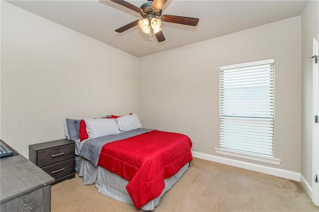 422 Scotch Pine Dr, Ponchatoula, LA 70454 - bedroom featuring baseboards, light colored carpet, and ceiling fan