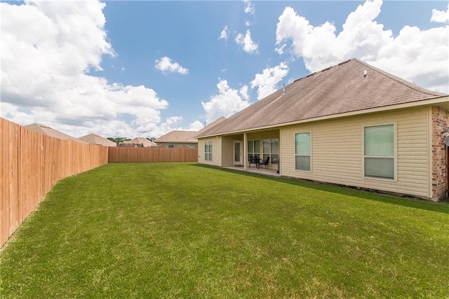 422 Scotch Pine Dr, Ponchatoula, LA 70454 - back of property with a patio area and brick siding