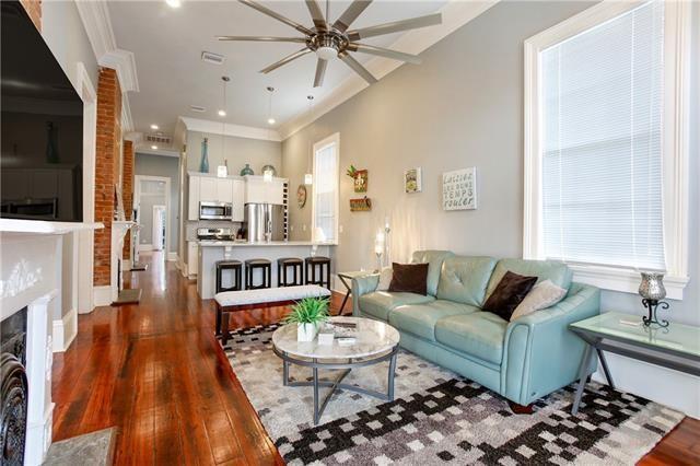 1355 Columbus St, New Orleans, LA 70116 - living area featuring a ceiling fan, dark wood-type flooring, crown molding, and recessed lighting