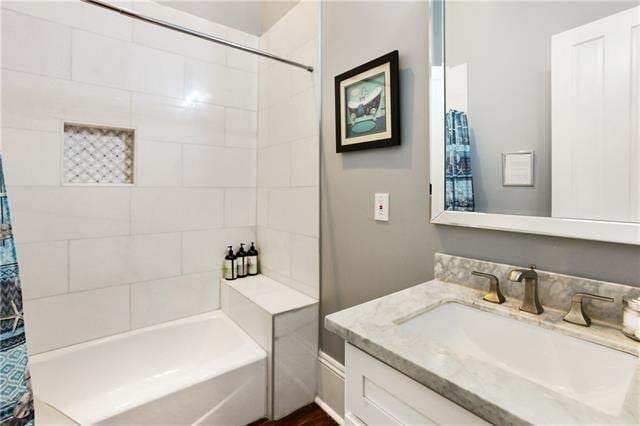 1355 Columbus St, New Orleans, LA 70116 - bathroom featuring vanity and shower / bath combo with shower curtain