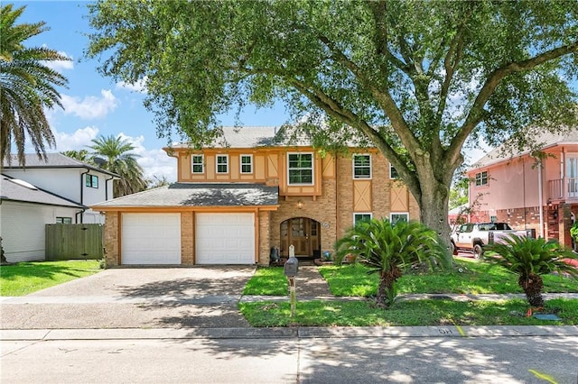 65 Monterrey Dr, Kenner, LA 70065 - view of front of house featuring driveway, brick siding, and an attached garage