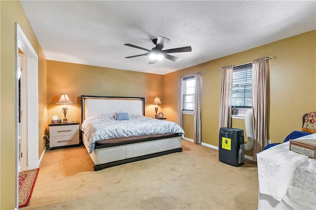 65 Monterrey Dr, Kenner, LA 70065 - bedroom with carpet flooring, baseboards, a ceiling fan, and a textured ceiling