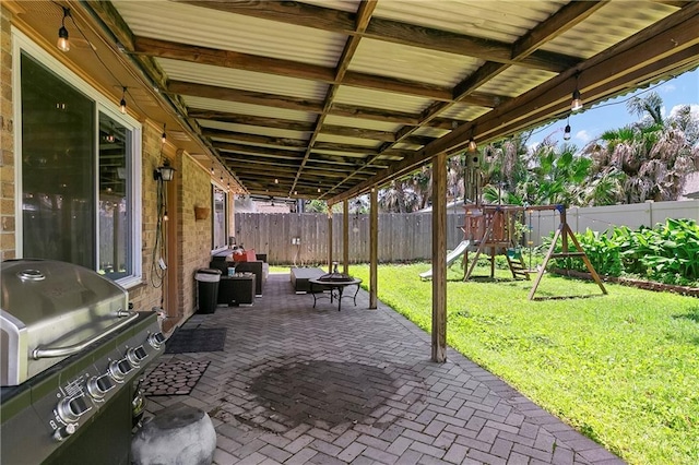 65 Monterrey Dr, Kenner, LA 70065 - view of patio / terrace with a playground and area for grilling