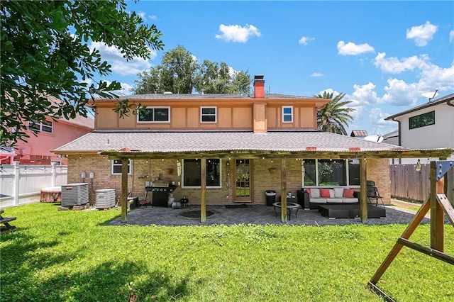 65 Monterrey Dr, Kenner, LA 70065 - back of house featuring cooling unit, a chimney, outdoor lounge area, and a patio