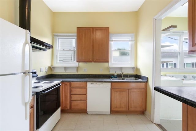 5655 Hawthorne Pl, New Orleans, LA 70124 - kitchen with white appliances, a sink, extractor fan, and brown cabinets