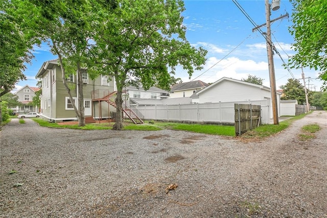 5655 Hawthorne Pl, New Orleans, LA 70124 - back of house with a residential view