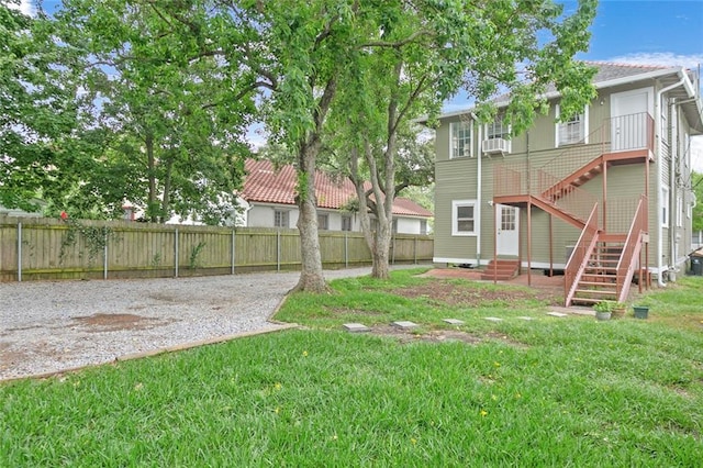 5655 Hawthorne Pl, New Orleans, LA 70124 - view of yard featuring entry steps, stairs, and cooling unit