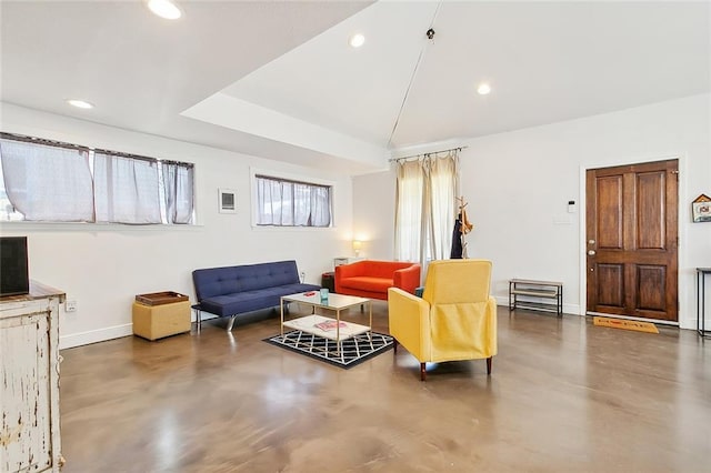 8621 Cohn St, New Orleans, LA 70118 - living area with concrete floors, recessed lighting, and lofted ceiling