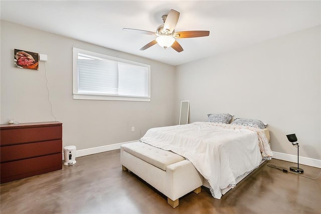 8621 Cohn St, New Orleans, LA 70118 - bedroom with concrete flooring and a ceiling fan