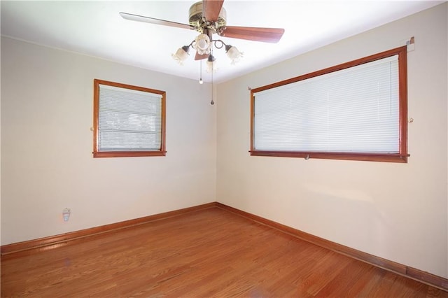 477 S Church St, Garyville, LA 70051 - empty room with wood finished floors, baseboards, and a ceiling fan