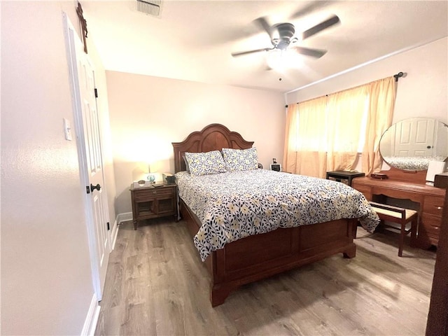 29 Brandon Hall Dr Unit D, Destrehan, LA 70047 - bedroom featuring light wood-type flooring, baseboards, and ceiling fan