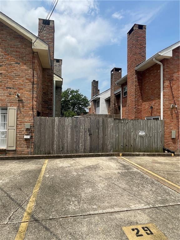 29 Brandon Hall Dr Unit D, Destrehan, LA 70047 - view of uncovered parking lot