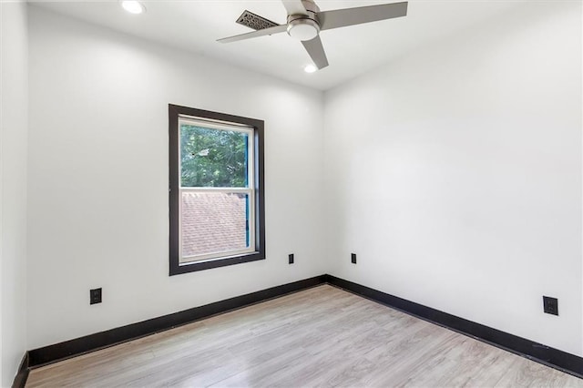 5400 N Rampart St, New Orleans, LA 70117 - spare room featuring light wood finished floors, recessed lighting, a ceiling fan, and baseboards