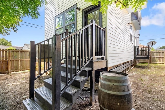 5400 N Rampart St, New Orleans, LA 70117 - wooden deck with stairway and a fenced backyard
