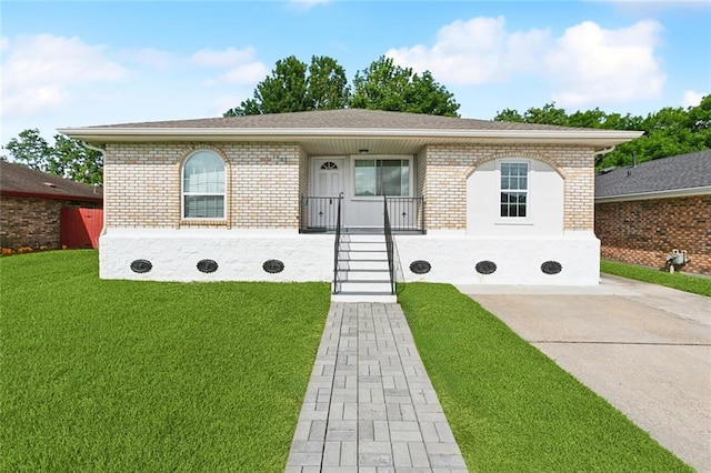 7500 Primrose Dr, New Orleans, LA 70126 - view of front of house with a front lawn, brick siding, covered porch, and a shingled roof