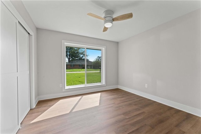 602 Susan Dr, Hammond, LA 70403 - unfurnished bedroom with wood finished floors, baseboards, and a closet