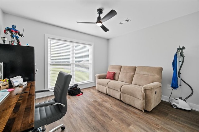 3508 Main St, La Place, LA 70068 - office space with a ceiling fan, wood finished floors, and baseboards