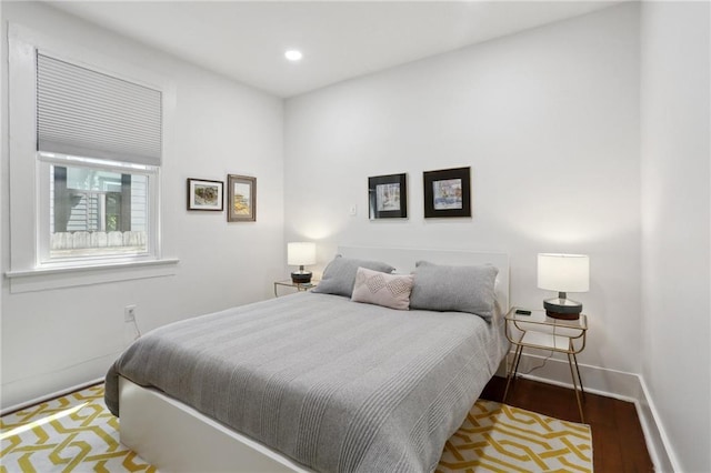 304 Henry Clay Ave, New Orleans, LA 70118 - bedroom with baseboards, wood finished floors, and recessed lighting