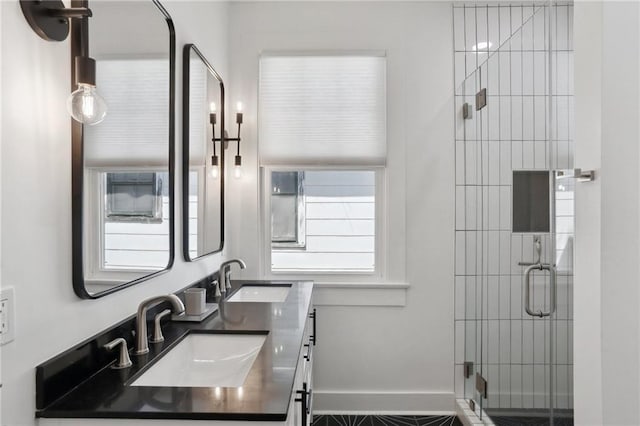 304 Henry Clay Ave, New Orleans, LA 70118 - full bath with double vanity, a stall shower, and baseboards