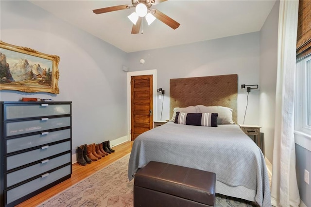 304 Henry Clay Ave, New Orleans, LA 70118 - bedroom with wood finished floors, ceiling fan, and baseboards