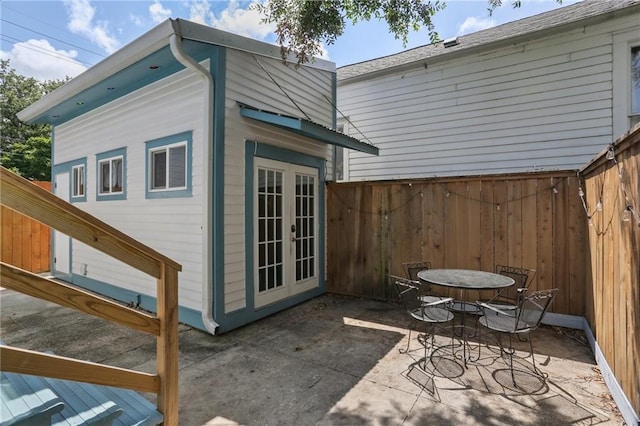 304 Henry Clay Ave, New Orleans, LA 70118 - view of patio / terrace featuring french doors and outdoor dining space