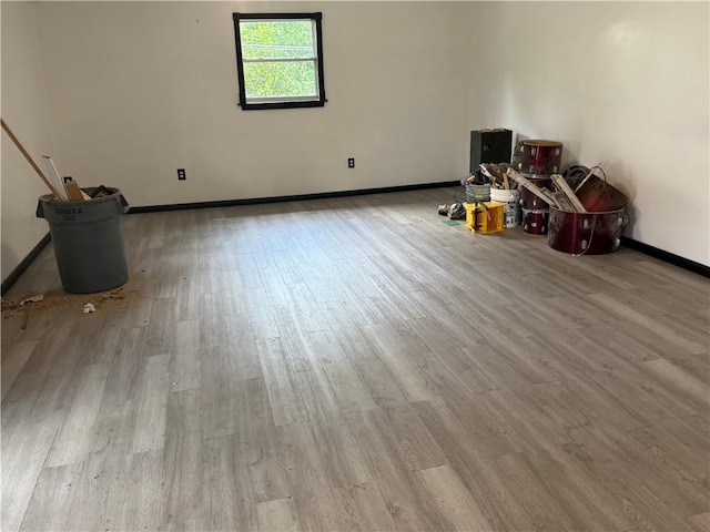 5022 Mcmurtry St, Marrero, LA 70072 - unfurnished living room featuring wood finished floors and baseboards
