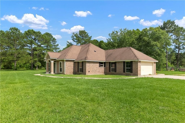 15488 Lake Ramsey Rd, Covington, LA 70435 - view of front of property with driveway, an attached garage, and a front lawn