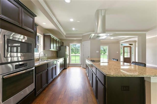 15488 Lake Ramsey Rd, Covington, LA 70435 - kitchen with stainless steel appliances, a sink, a center island, island range hood, and dark brown cabinets