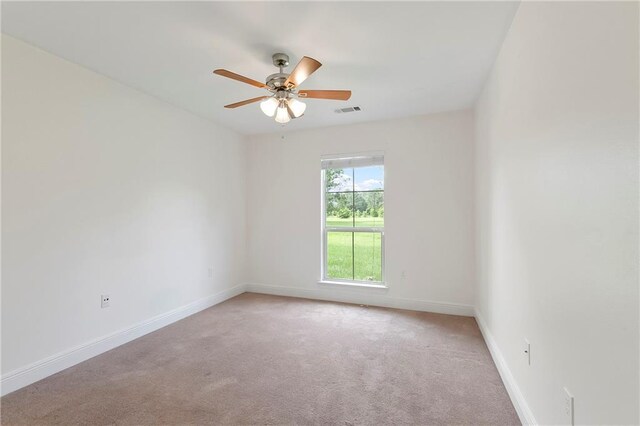 15488 Lake Ramsey Rd, Covington, LA 70435 - empty room featuring ceiling fan, carpet, and baseboards